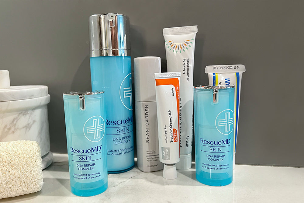 a complete skin therapy kit featuring RescueMD serum bottles and other beauty products
