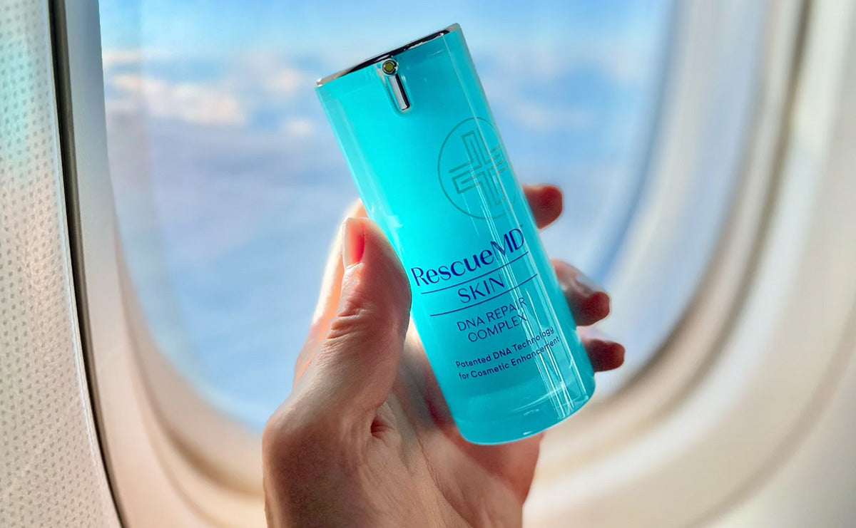 close-up shot of RescueMD serum bottle in a woman's hand against a plane window, illustrating its travel-friendly benefits.