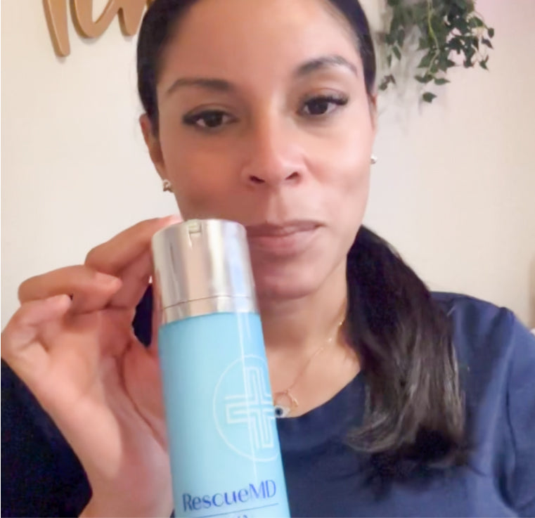 a female esthetician Karen Clark having the RescueMD product bottle package, recommending the product to patients
